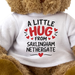 Close-up of the two-line A Little Hug From Saxlingham Nethergate T-shirt design