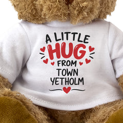 Close-up of the two-line A Little Hug From Town Yetholm T-shirt design