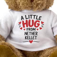 Close-up of the two-line A Little Hug From Nether Kellet T-shirt design