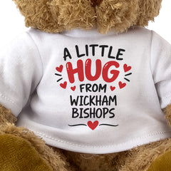 Close-up of the two-line A Little Hug From Wickham Bishops T-shirt design